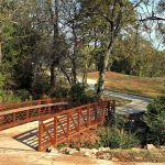 View of the Walking Path Bridge in Avedis Park. The Park was designed by Renaissance Architecture in Mounds, Oklahoma.