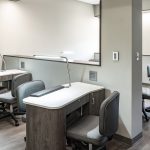 The manicure desks area at Metro Technology Centers- Cosmetology Salon was designed by Renaissance Architecture.