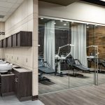 The hair wash area and facial room at Metro Technology Centers- Cosmetology Salon was designed by Renaissance Architecture.