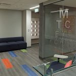 The unique glass reception area of Metro Technology Centers- Eye Care Technologies Suite was designed by Renaissance Architecture.