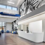 The welcome desk of Metro Technology Centers- Automotive Training Center was designed by Renaissance Architecture.