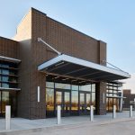 The front entrance of Metro Technology Centers- Automotive Training Center was designed by Renaissance Architecture.