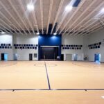 The interior view of the Liberty Public Schools Gym and stage was designed by Renaissance Architecture.